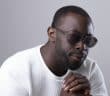 African American Man in Sunglasses Looking Suspiciously