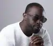 African American Man in Sunglasses Looking Suspiciously