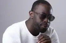 African American Man in Sunglasses Looking Suspiciously